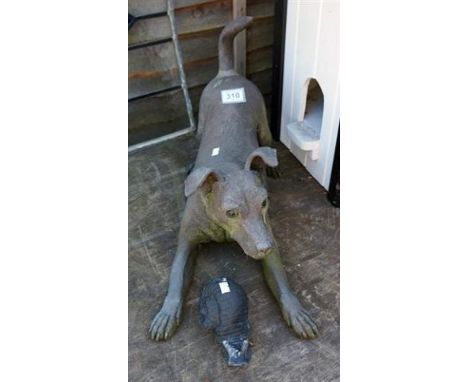 Model dog figure and snail