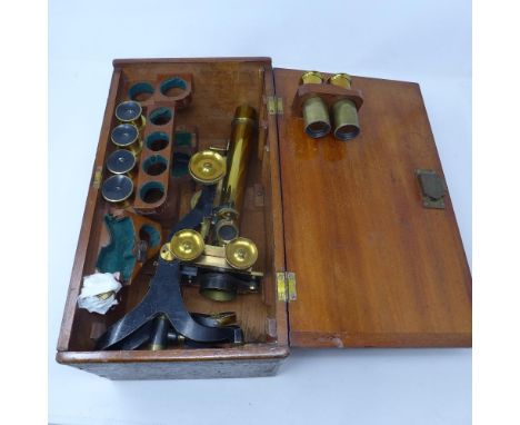 A vintage Swift and Son brass microscope, in mahogany case 
