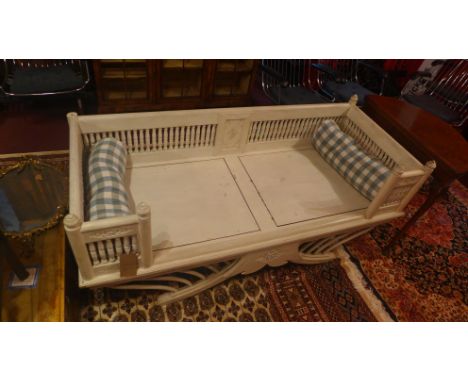 A Balinese hardwood bench, H:101 W.127 D.70cm, one arm needs reparing