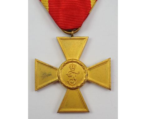Baden: Dienstauszeichnung, für 15 Jahre (1913-1918).Buntmetall vergoldet, am Bande.Zustand: I-II