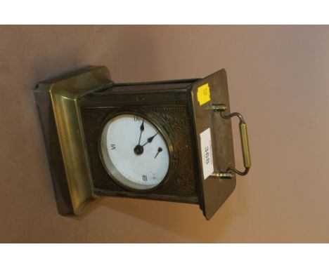 A VINTAGE BRASS EFFECT CARRIAGE CLOCK
