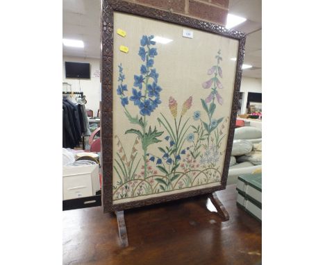A TAPESTRY GLAZED FIRESCREEN