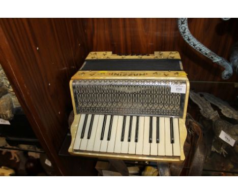 A VINTAGE MAZZINI ACCORDION 