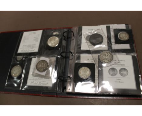 AN ALBUM OF VINTAGE WHITE METAL COINAGE TO INCLUDE CROWNS