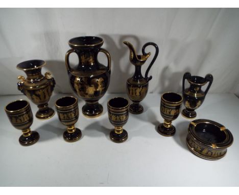 Nine pieces of ceramics by Spyropoulos in black and 24 K gold decoration featuring Greek key and classical scenes comprising 