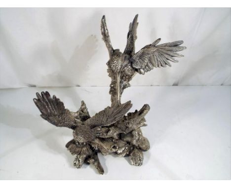 A hallmarked sterling silver statue entitled Skydance, issued in a limited edition of 25 / 100 by Country Artists, 27cm (h) E