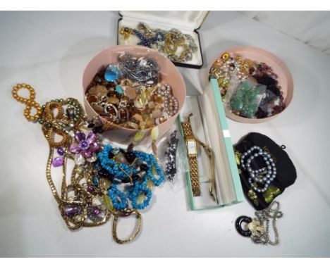 A good mixed lot of predominantly modern costume jewellery to include a gilded silver necklace, jade beads for re-stringing, 