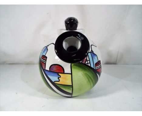 Lorna Bailey - a good quality ceramic Lorna Bailey teapot with balloon handles entitled The Deco House. Estimate £25 - £50