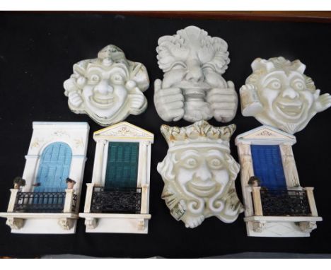 A quantity of stone ceramic and plaster wall plaques, largest plaques measuring 26 cm x 18 cm. Estimate £20 - £30