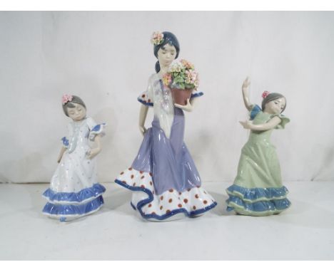 Lladro - Three Lladro figurines by Lladro to include 5490 'Flor Maria' and two flamenco dancing girls, stamped and impressed 