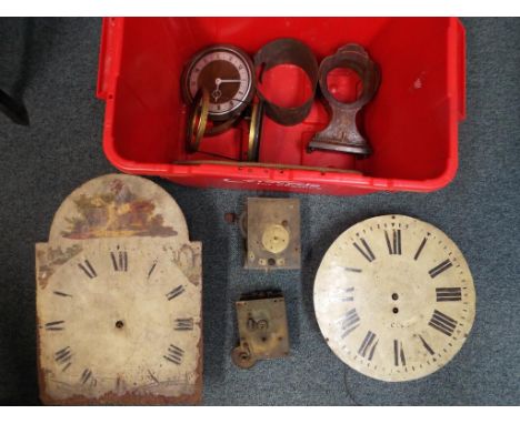 A collection of clock parts to include a 19th century 30 hour longcase movement and arched painted dial, a single fusee movem