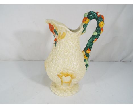 Clarice Cliff - a Clarice Cliff ceramic water jug decorated in the Celtic Harvest pattern with makers mark to the base, also 
