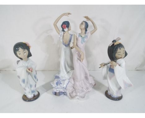 Lladro - Three figurines by Lladro to include 5601 'Ole', 6150 'Playing The Flute' and 6151 'Bearing Flowers', largest model 