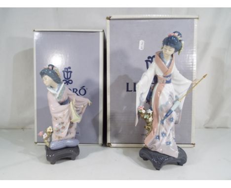 Lladro - Two boxed Lladro figurines comprising 1447 'Michico' and 1451 'Teruko', largest model being approximately 27.5 cm (h