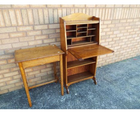 A compact oak fall front bureau with pigeon hole fitted interior 122 cm (h) x 58 cm x 23 cm and a light oak rectangular side 