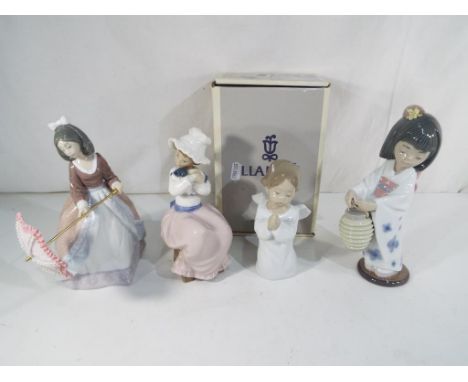 Lladro - Three figurines by Lladro comprising 5210 'Jolie', 4538 'Angel Praying' (boxed), 6231 'Oriental Lantern', lot also i