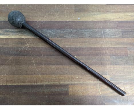 A knobkerrie traditionally from Southern and Eastern Africa and used for hunting and warfare Location:If there is no conditio