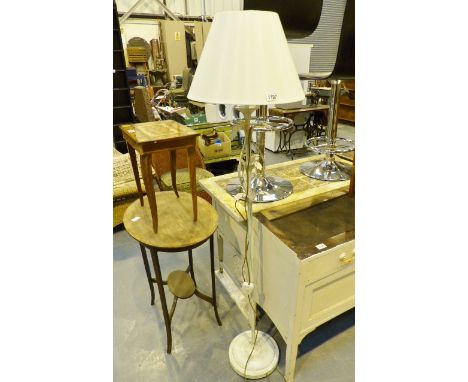 Metal standard lamp with leaf design.