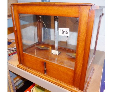 Pair of antique walnut cased chemist scales by Stone, Glouscester Street, London