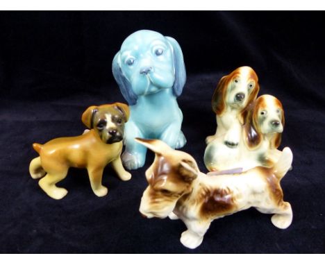 Four dog figures, Royal Dux Goebel and others