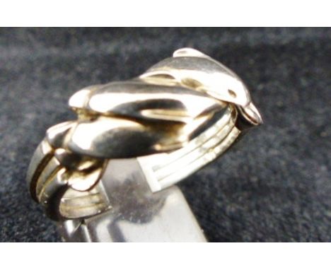 Sterling silver three piece dolphin puzzle ring