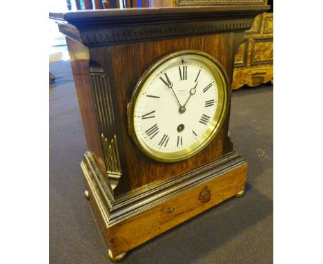 Dent of Cocksper Street bracket clock. Wooden cased, enamel dial. Movement marked CHVCN Paris 40669. Key and pendulum in offi