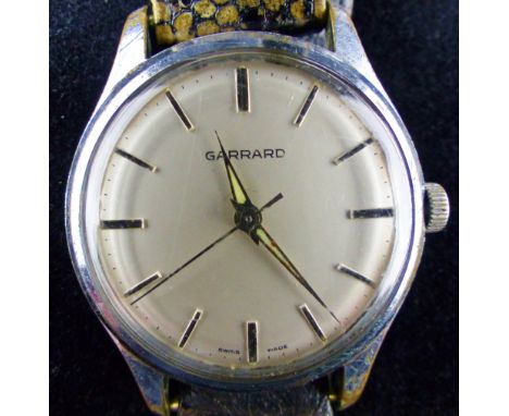 Garrard vintage stainless steel gents wristwatch. Working at lotting up.