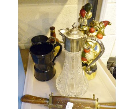 Tray of kitsch bar items including musical clown decanter and a claret jug