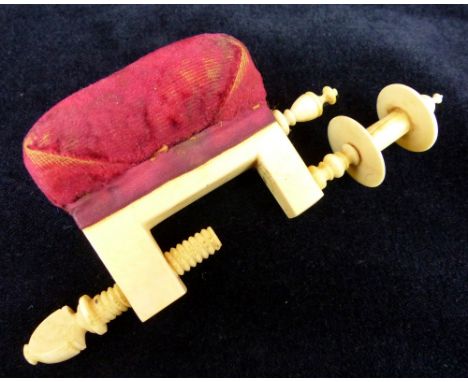 Victorian ivory pincushion and bobbin holder with screw table fixing.