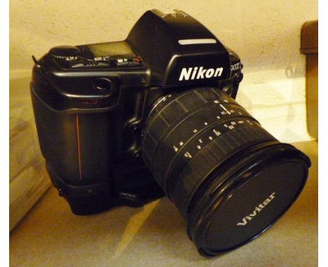 Nikon F90x camera with Nikon MB10 motor and Vivator aspherical lens