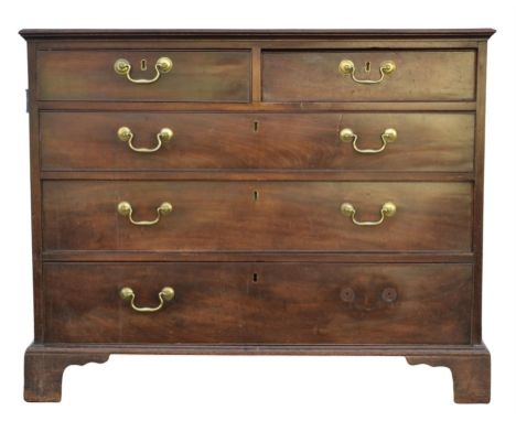 George III mahogany chest of drawers, the moulded banded top above two short and three long drawers, on shaped bracket feet, 