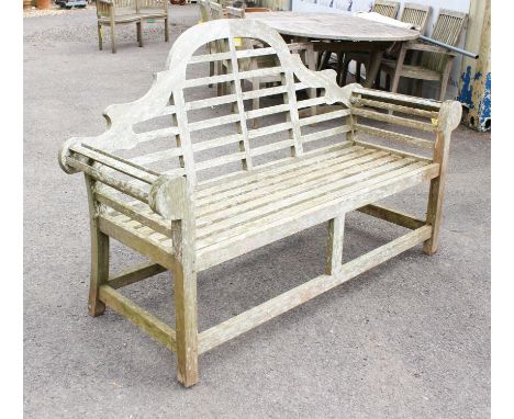 A Lutyens style teak garden bench, 106cm high x 166cm wide x 57.5cm deep