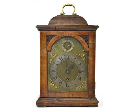A late 18th century walnut case bracket clock by Conyers Dunlop London.  The cushion top case with single brass handle over a