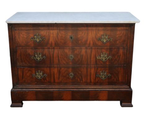 A French Restauration mahogany commode, 1820s, with a later white marble top above three flame veneered drawers and an apron 