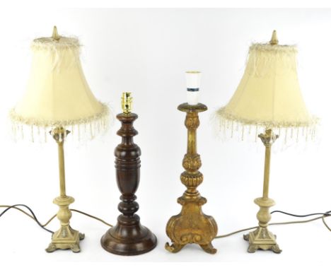 A late 17th century style gilt wood table lamp, Italian, height 52cm, together with a turned oak table lamp and a modern pair