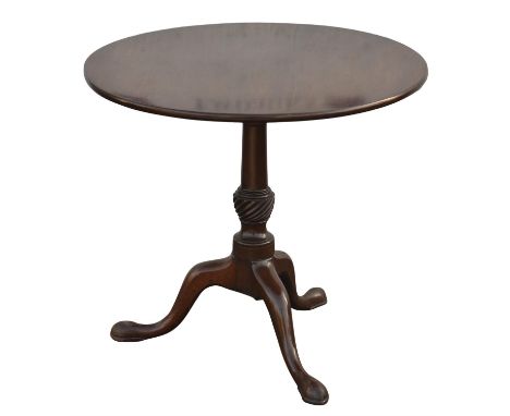 A George II mahogany tilt-top tripod table, the one piece top on a wrythen turned stem and cabriole base, H 73cm, diam. 77cm