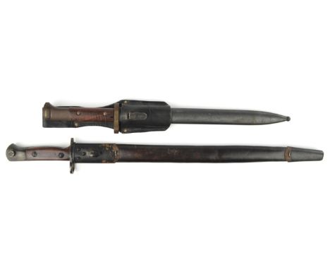 A Czechoslovak VZ24 Bayonet, 30cm unmarked blade, metal scabbard marked tgf, leather frog. together with another unmarked swo