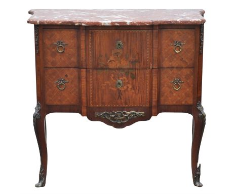 A Louis XVI style kingwood and parquetry commode, French, 1900s, of breakfront outline, the rouge mottled marble top above tw