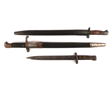 A Lee Enfield SMLE 1907 pattern bayonet by Wilkinson, 43cm blade and leather covered scabbard,  1887 Pattern Martini Henry Sw