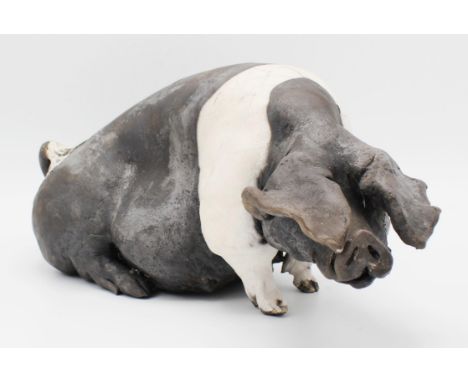 Christine Cummings, modern ceramic sculpture depicting a saddleback pig, 'Sitting Sow', signed and dated May 2012.  15cm high