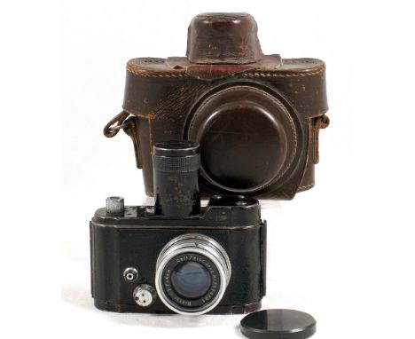 Black Robot Luftwaffen Clockwork Camera. #F-48088-6. (condition 5/6F) working. With CZJ Biotar 4cm f2 lens marked Luftwaffen 