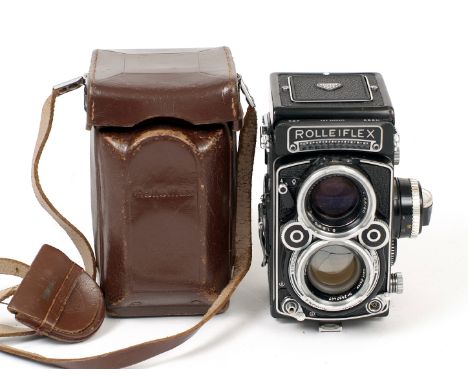 Metered Rolleiflex F2.8 #2489493. With Planar 80mm f2.8 (condition 5F). With case, strap &amp; yellow filter (rough).[R]