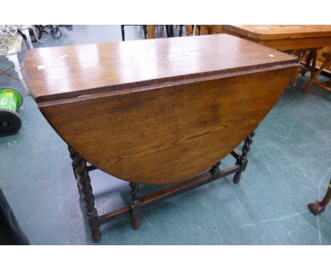 Oak twin drop flap gate leg table with twisted legs