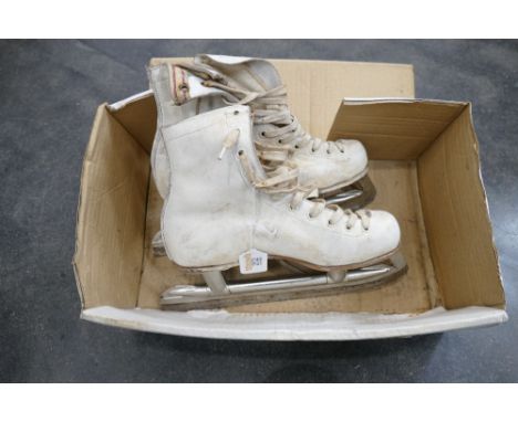 Pair of vintage white ice skates