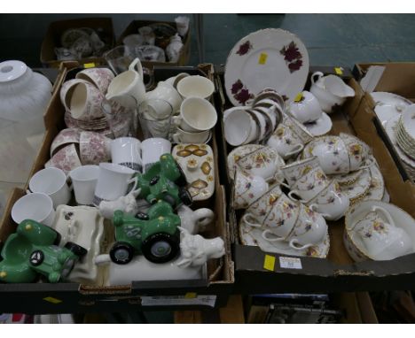 Two boxes of part tea sets, Royal Vale lidded butter dishes, tractor egg cups etc