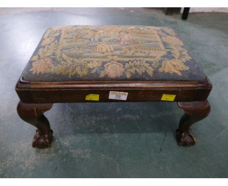 Tapestry topped footstool on ball and claw feet 