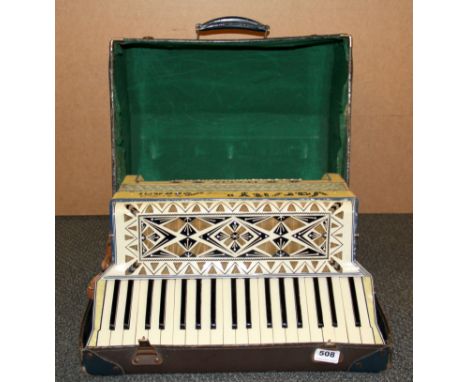 A cased piano accordion.