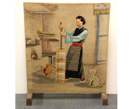 An Eastern appliqué and hand painted fire screen, W. 68cm, H. 82cm.