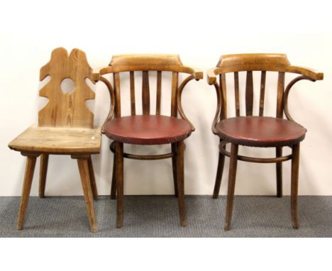 A pair of 1930's bench wood chairs and a small rustic pine chair.
