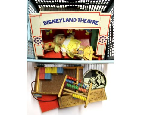 A Disney Land puppet theatre and other toys.